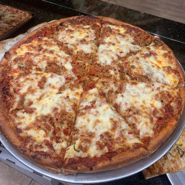 Sausage & Pepper deep dish pizza.